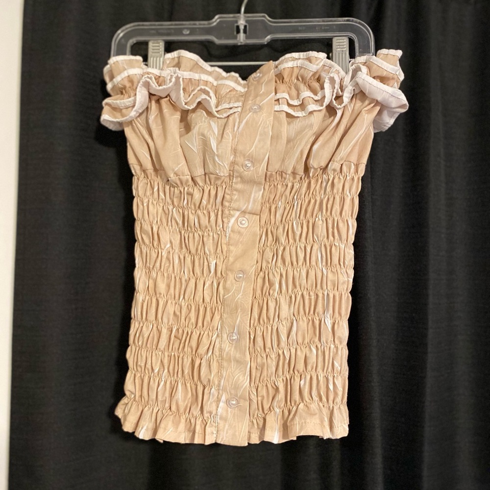 Blue Base strapless top. Tan & white in color. Size unknown, fits like small.